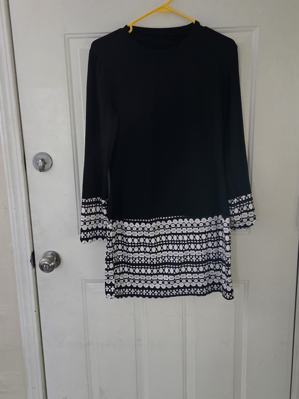 Black Mini Dress with White Patterned Hem and Cuffs